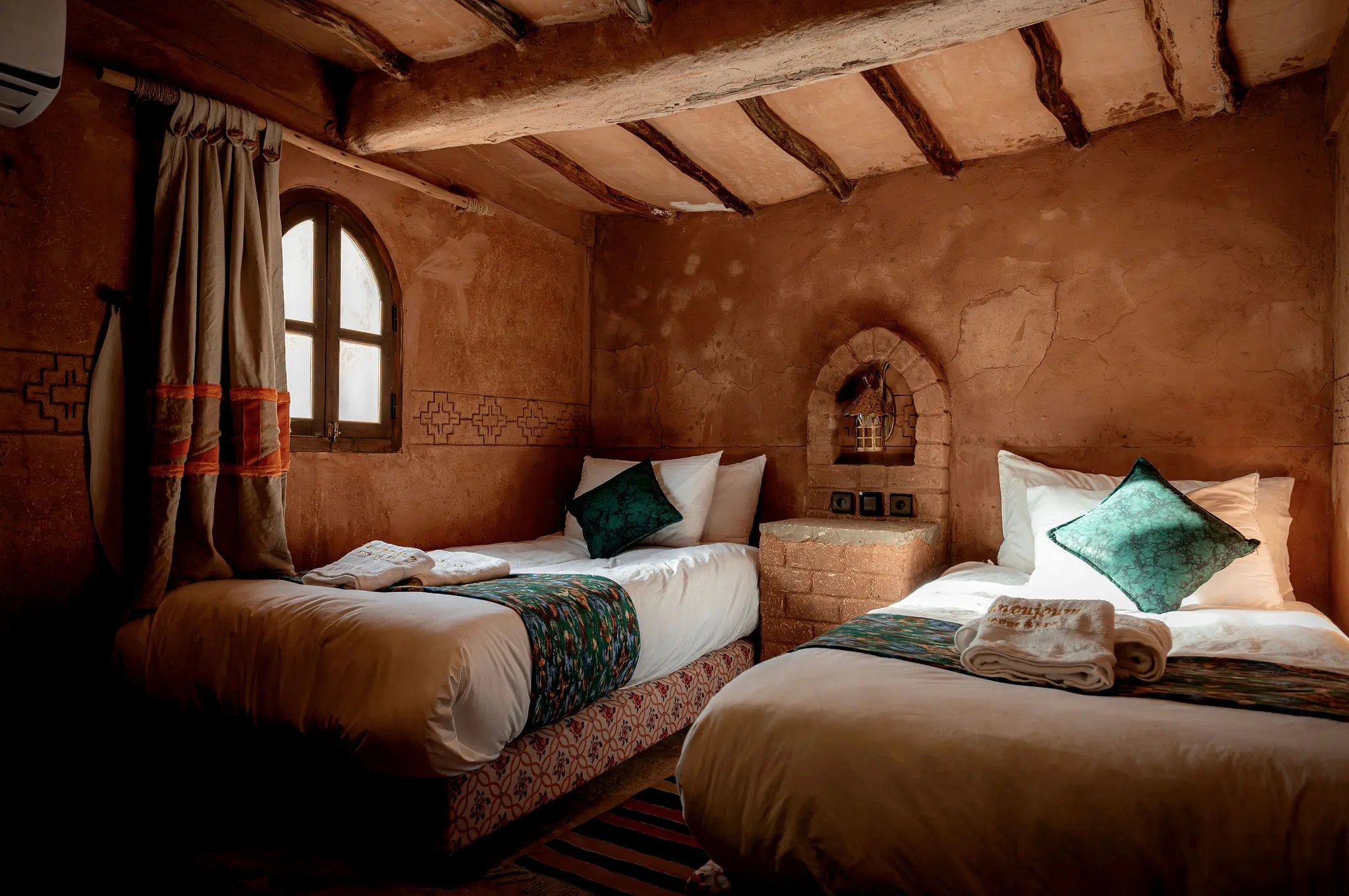 Chambre avec deux lits